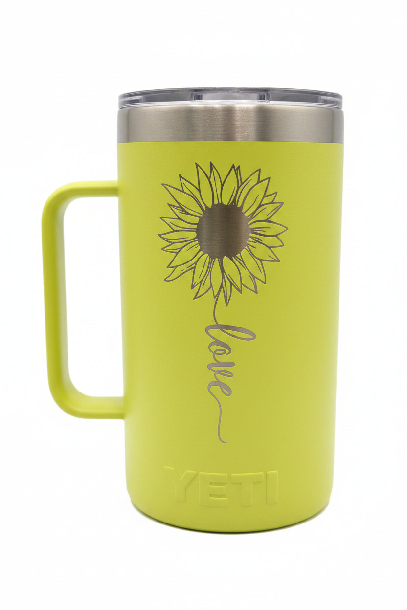 Yellow YETI mug with sunflower design and 'love' text on a white background